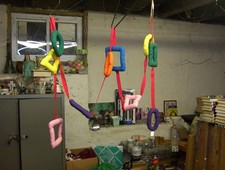 STUFFED HANGING GEOMETRIC SHAPES/SQUARES, OVAL, ETC/VARIOUS COLORS/14 FT LONG