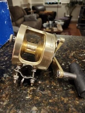 Fin-Nor 12-20 Light Conventional Fishing Reel with rod clamp Made in USA