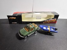 Majorette 1/64 série 300 Toyota Rav4 + Bateau Zodiac En Boite