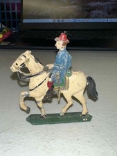 Vintage metal toy soldier on horseback, maybe lead
