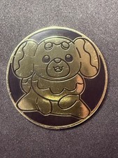 Pokémon Fidough duża złota moneta Pokemon TCG