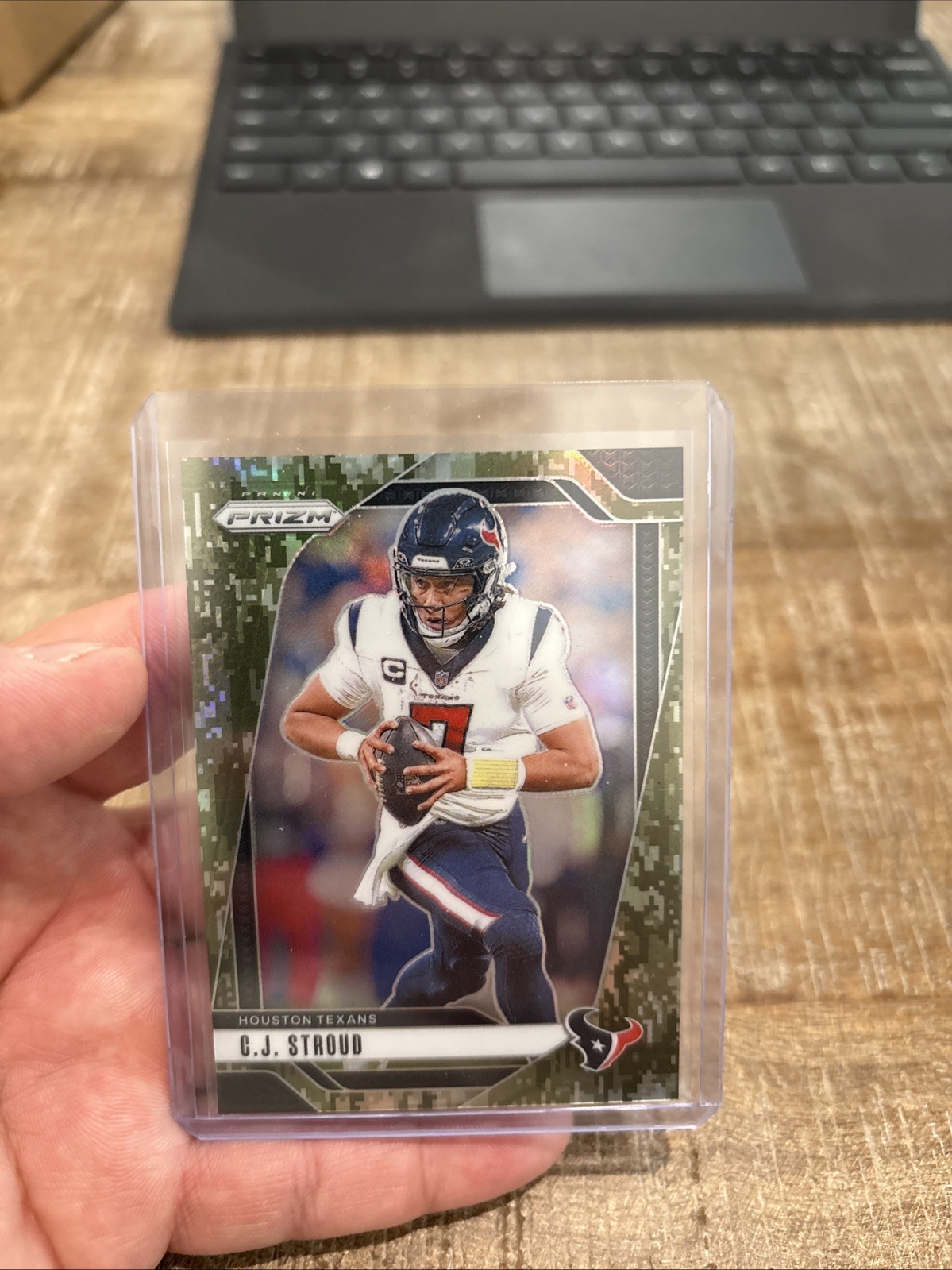 2024 Panini Prizm C.J. Stroud #111 Forest Camo Prizm /15