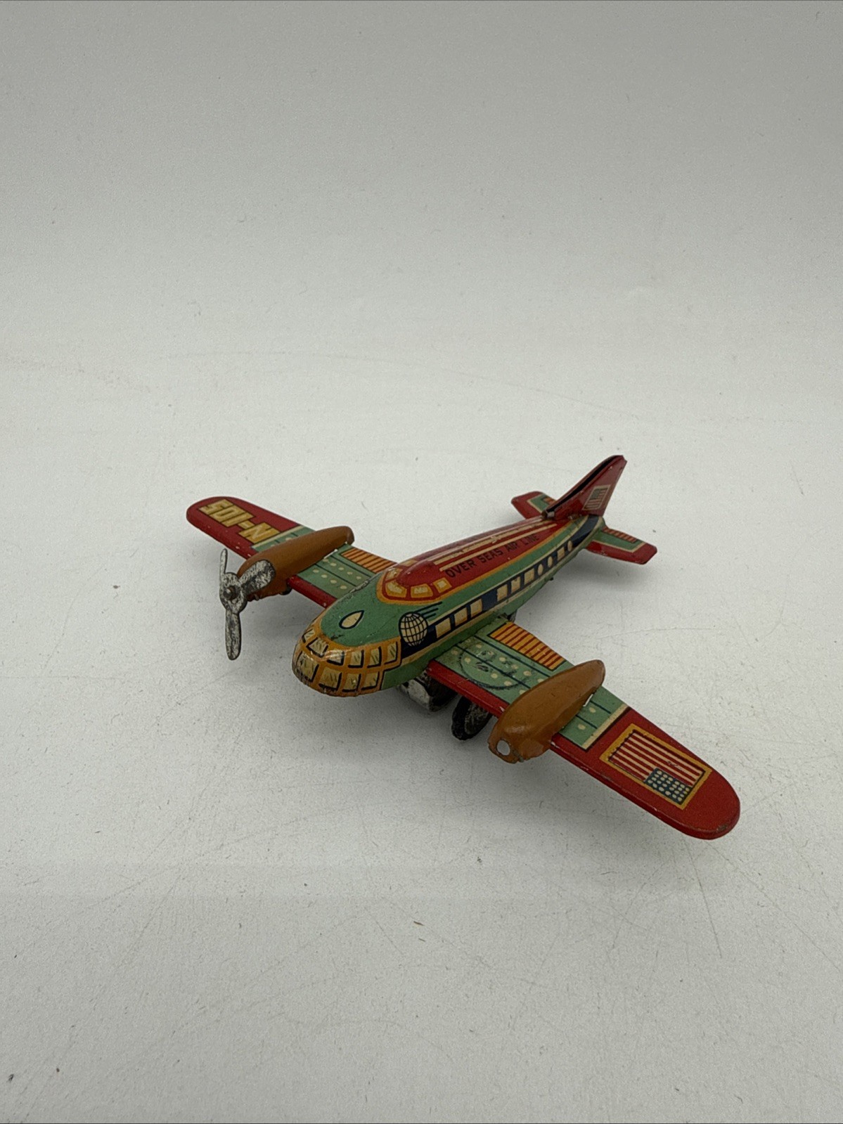 Vintage Japan Tin Litho Toy Airplane Wind Up Mechanism Missing 1 Propeller