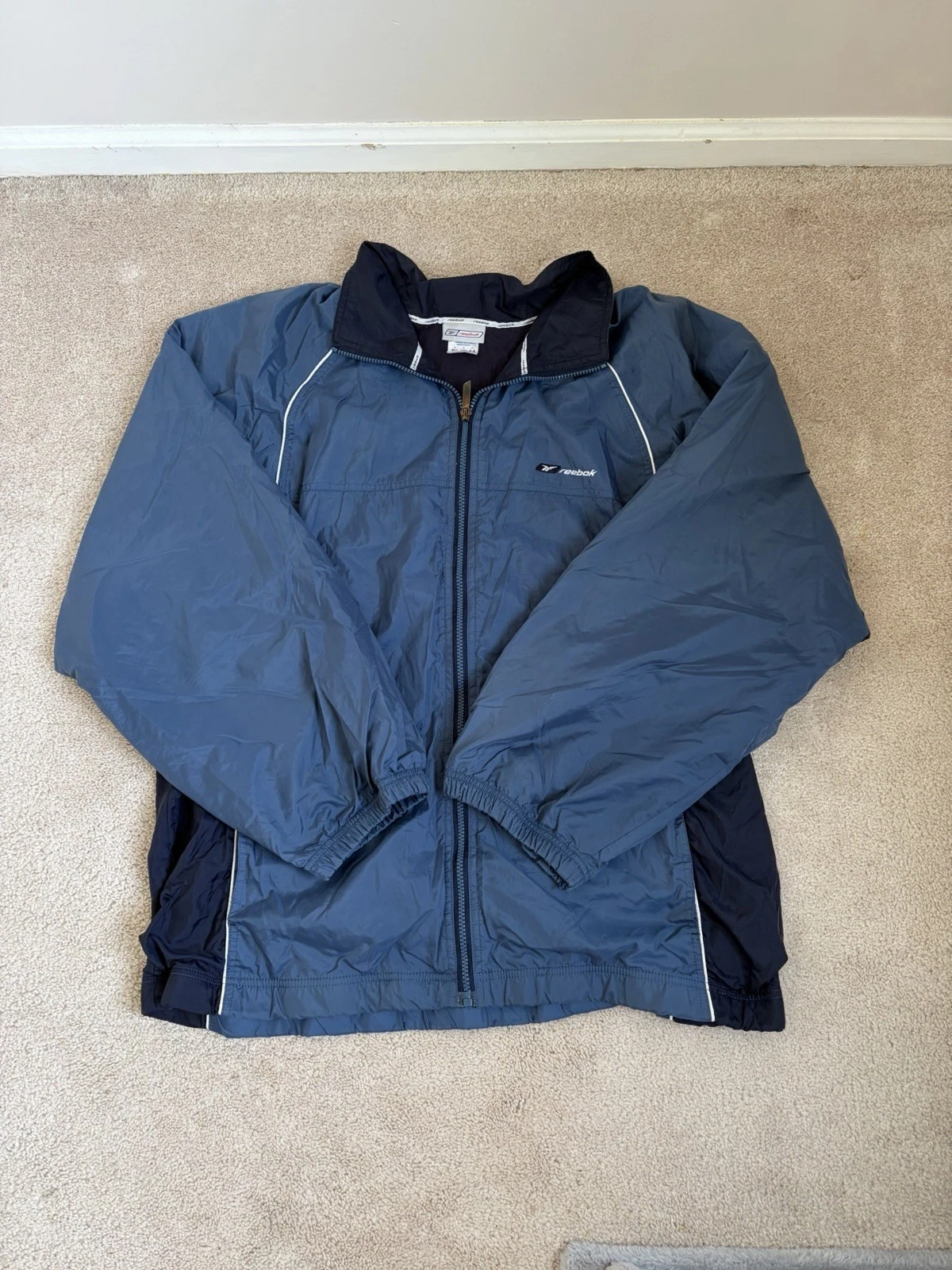 Vintage Reebok Men's Blue Zip-zip Windbreaker - size XL
