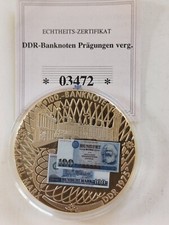 Gedenkpr&auml;gung Banknoten der DDR, vergoldet, mit 100 DDR Mark Farbaufkleber, M145
