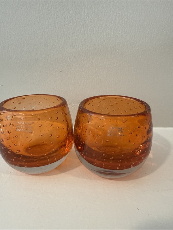 Two (2) Crate Barrel Amber orange Glass Votive Candle Holders Pop Relight Orange