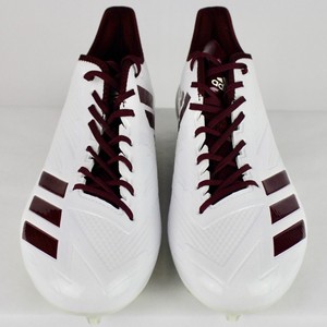 white and maroon cleats