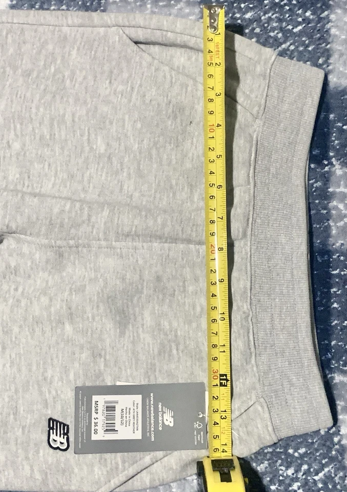 Pantalones deportivos New Balance ATH gris jaspeado Foto 3 de 4