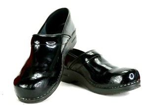 sanita black patent clogs