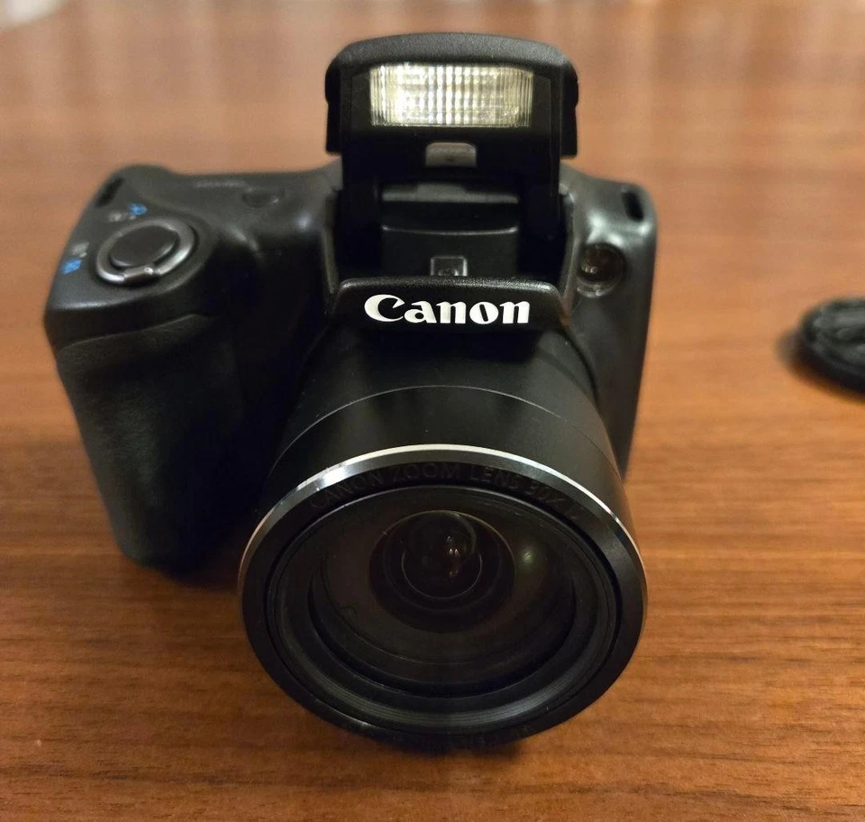 Cámara digital compacta Canon PowerShot SX400 IS con estuche cargador batería Foto 3 de 4