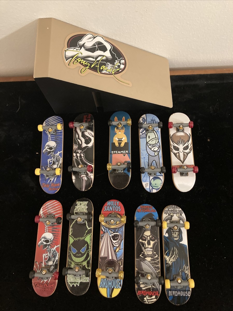 Lot of 10 Teck deck mini skateboards plus ramp with Tony hawk sticker on it