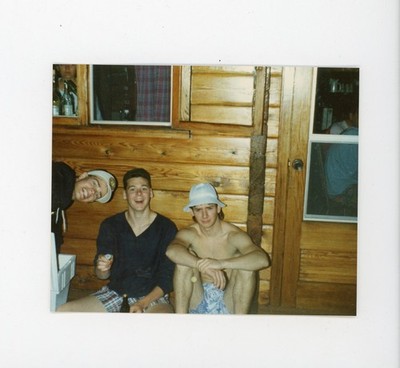 Vintage snapshot color photo - guys at cottage  party after graduation