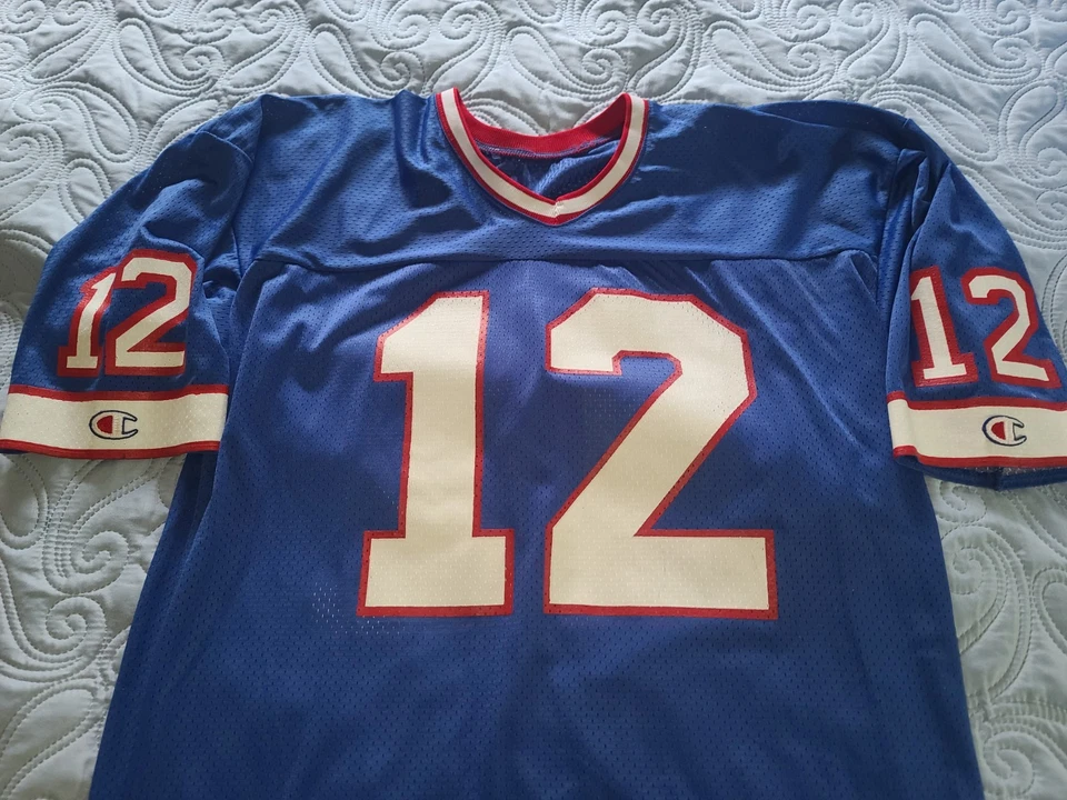 Camiseta de fútbol americano Jim Kelly #12 Buffalo Bills CAMPEÓN vintage de la NFL talla 48 Foto 2 de 4