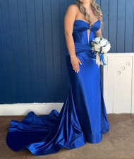 Prom Dress Sherry Hill Size 10 but I wear 8. Dry Cleaned. Worn for 6 hours.