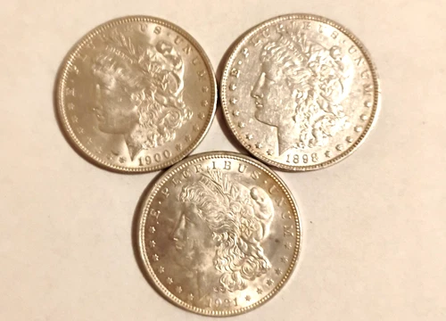 lot of three au/bu morgan dolars