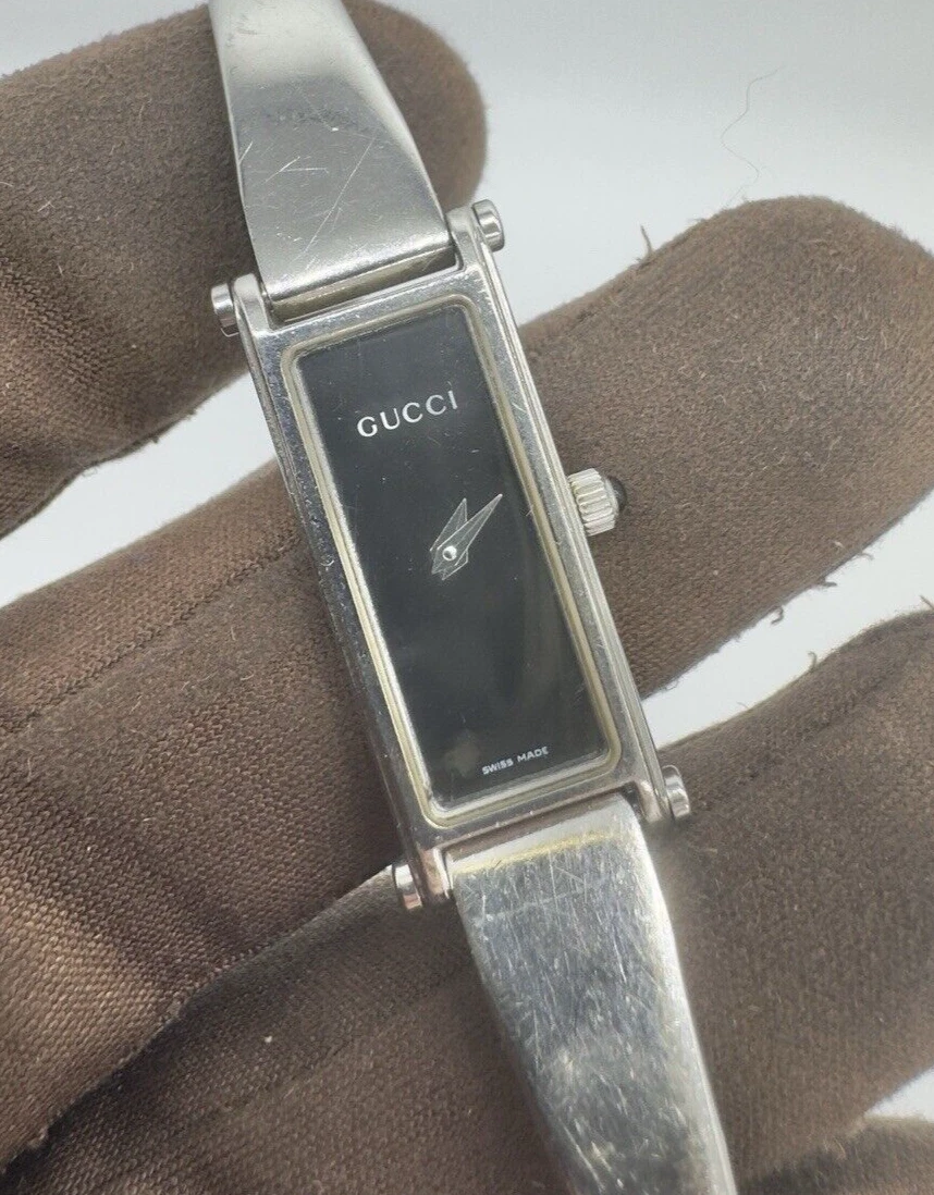 Montre à quartz femme Gucci 1500L en acier inoxydable cadran noir ETA 280.002