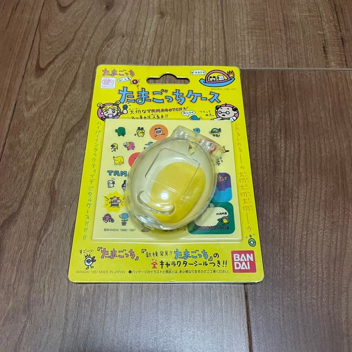 New Yellow Bandai Tamagotchi Official Clear Egg Case + New Species
