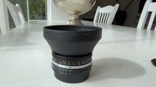 Nikon Nikkor 50mm f/1.8 Series E Pancake – AI / AiS – mit Gegenlichtblende HR-2