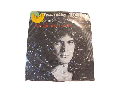 45 RECORD - GINO VANNELLI - LIVING INSIDE MYSELF.    SEALED COPY