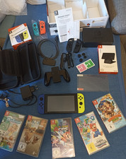 Nintendo Switch Konsole im sehr guten Zustand + Spiele …