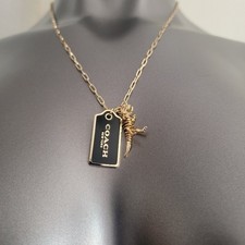 Coach Signature Hangtag Rexy Gold Tone Pendant Necklace NWT
