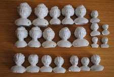 22 antique frozen charlotte doll heads