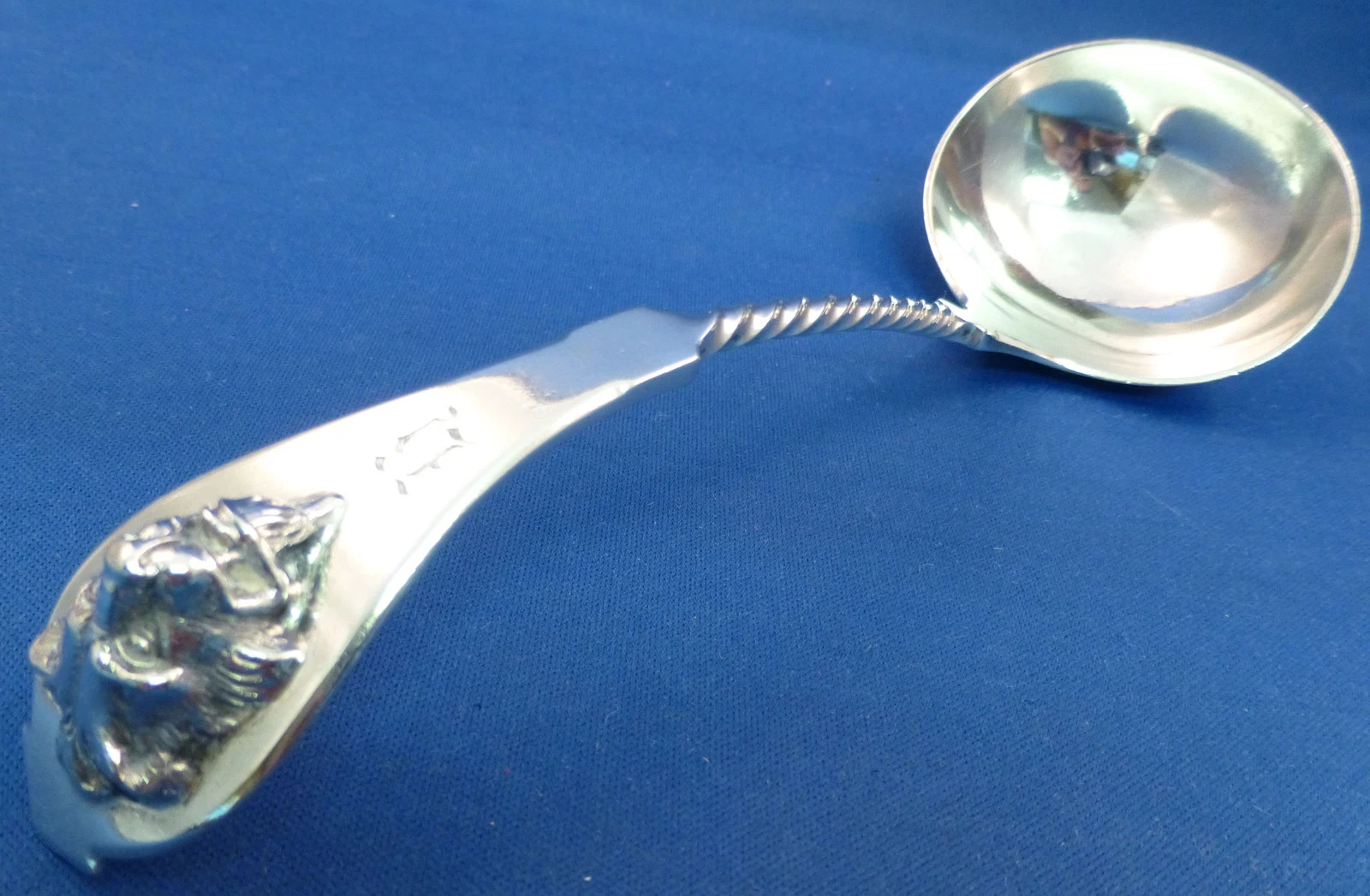 LION HEAD COIN SILVER GRAVY LADLE