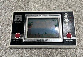 1982 NINTENDO GAME & WATCH TURTLE BRIDGE HANDHELD LCD GAME TESTED WORKING