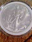 1987 DATED .999 FINE SILVER EAGLE DOLLAR BULLION COIN IN UNCIRCULATED CONDITION