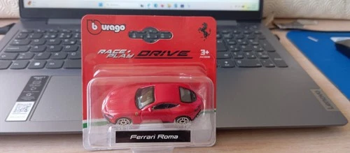 BBURAGO - FERRARI ROMA    IN BLISTER      1/64 APROX *NEW*
