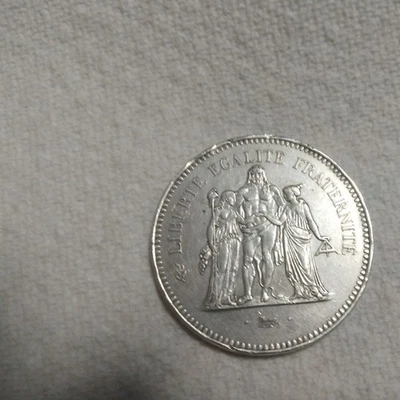 L'argent, une pièce d'argent, cinquante francs - Photo 1/2