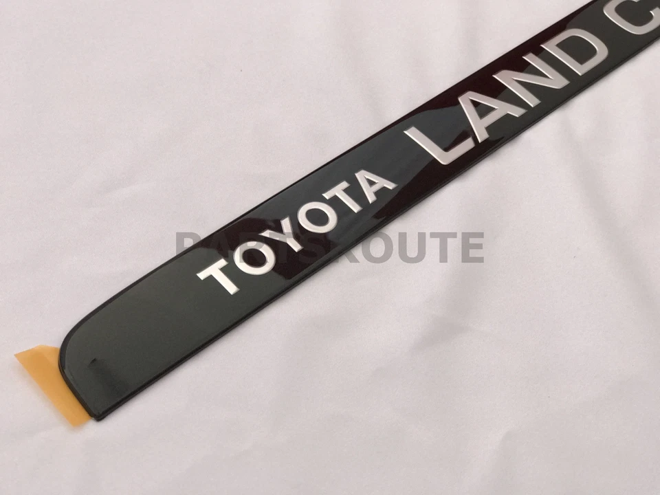 Emblema de puerta trasera original Toyota Land Cruiser OEM FJ80 FZJ80 1991-1997 Foto 2 de 4