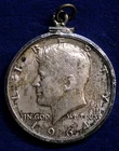 1964 Kennedy 90% Silver Half Dollar w/ Sterling Silver Bezel .99 start no reserv
