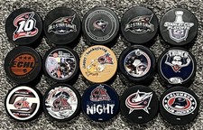 Lot of 15 Columbus Blue Jackets Hockey Pucks: Commemorative, Logo & Novelty