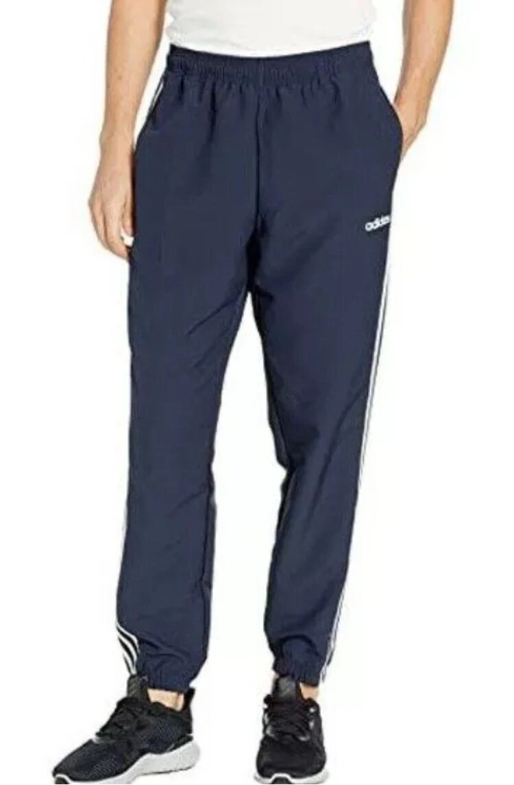 Adidas essentials wind pants cheap