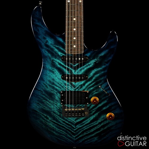 black guitars emerald