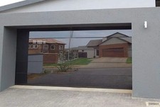 Frameless Tinted Glass Garage Door - 16 X 7 ft