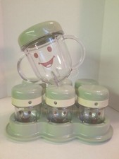 Magic Baby bullet 6 cups with dials tray and two handle cup lids included