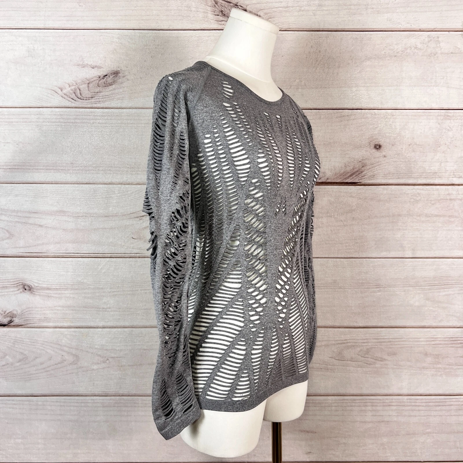 alo-yoga wanderer long sleeve cutout distressed workout shirt