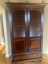 armoire wardrobe closet with drawers