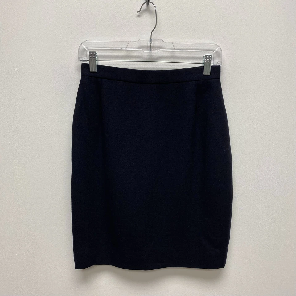 Falda lápiz AKRIS Bergdorf Goodman negra de lana virgen plisada por encima de la rodilla 6