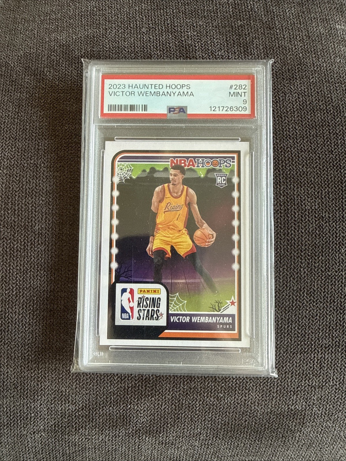 Panini 2023-24 Haunted Hoops Rising Stars Victor Wembanyama RC #282 PSA 9
