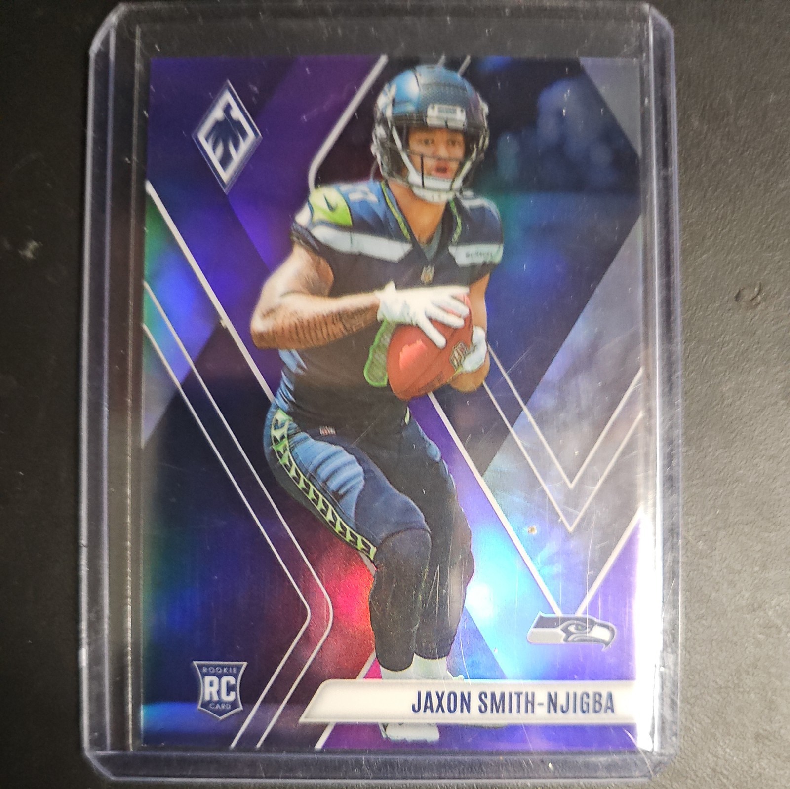 2023 Panini Phoenix - Jaxon Smith-Njigba #106 Purple Seismic 077 /125 (RC)