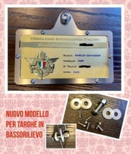 PORTA TARGA FMI + KIT VITI ATTACCO UNIVERSALE  PER TARGHE IN BASSORILIEVO