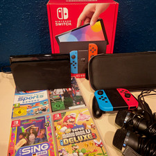 Nintendo Switch OLED Bundle mit Joy-Cons, 4 Spiele …
