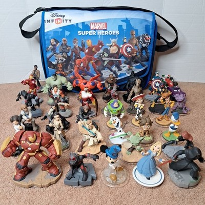 Lot Of 35 Disney Infinity 2.0 3.0 Toys Disney's Pixar Marvel Star Wars Alice Bag