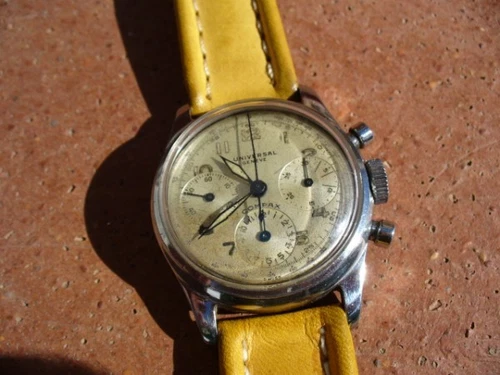 Orologio UNIVERSAL GENEVE Compax acciaio cassa a vite tasti a pompa 33mm