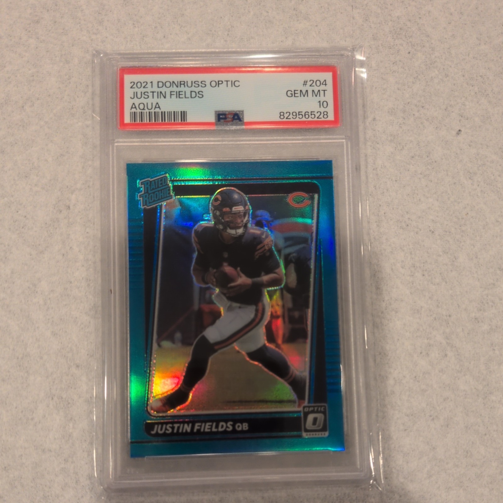 Justin Fields 2021 Donruss Optic #204 Aqua Prizm #’d/299 PSA 10 GEM MINT