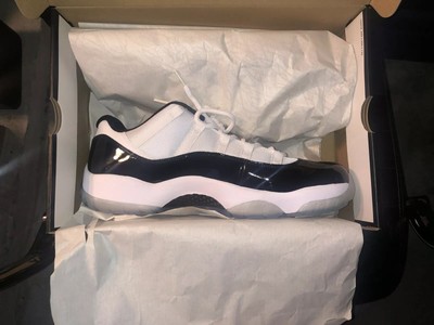 low top jordan 11 black and white