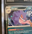 Graded 2024 POKEMON TRICK OR TRADE #057 GENGAR TAG 8.5 Fart Swirl Cosmos Holo